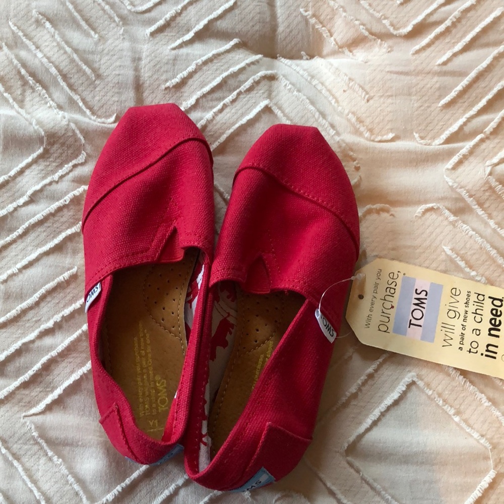 Toms youth size 1